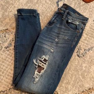 Skinny jeans with camo patches